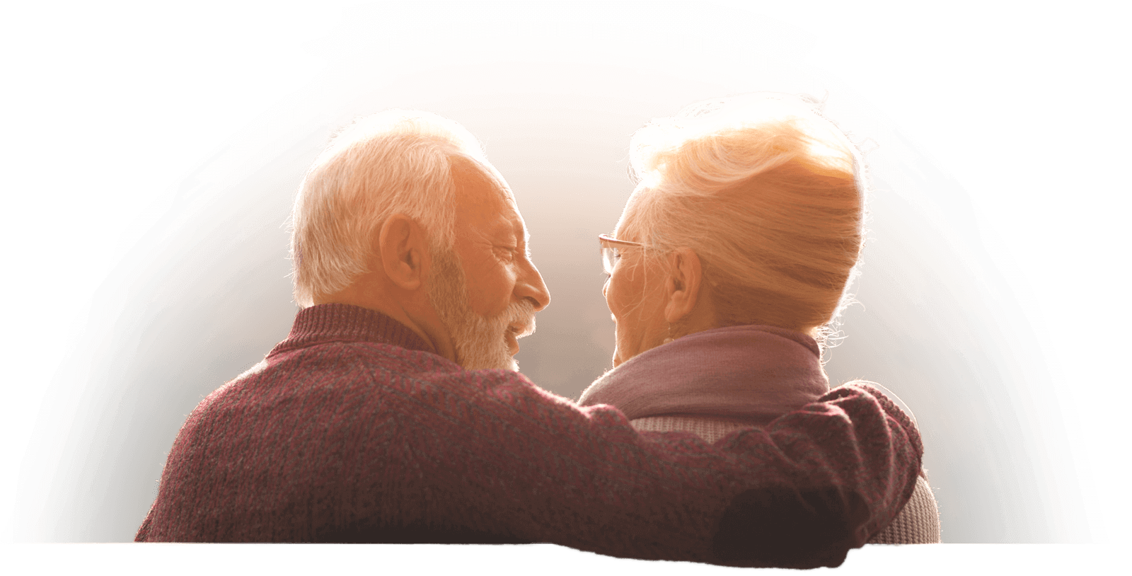 Mature couple sitting on bench